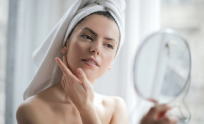 woman looking in mirror